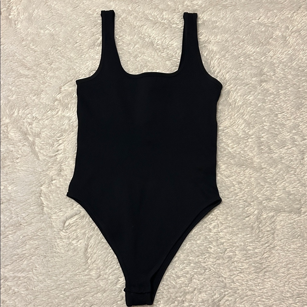 Slimming Black Ribbed Bodysuit